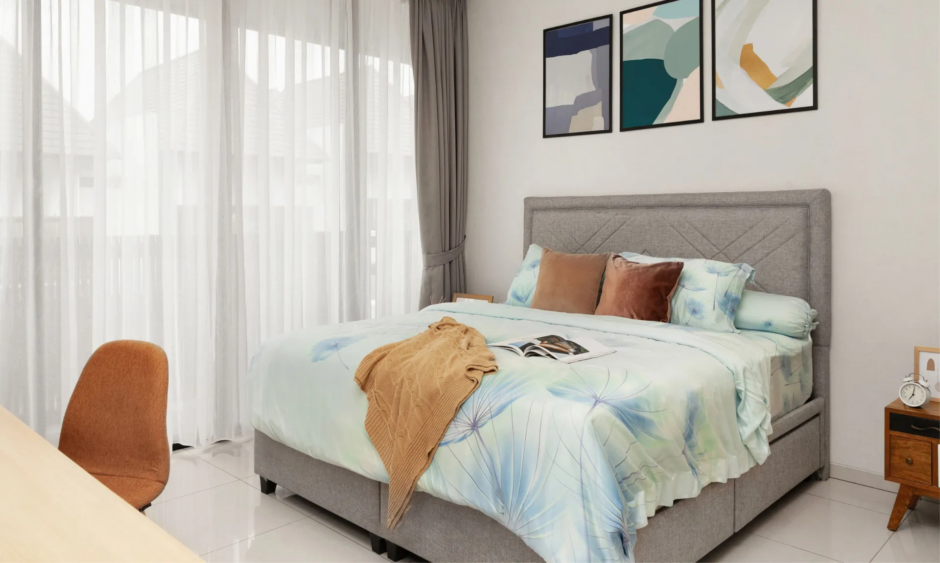 A modern bed with storage drawers presenting best storage solutions for small spaces