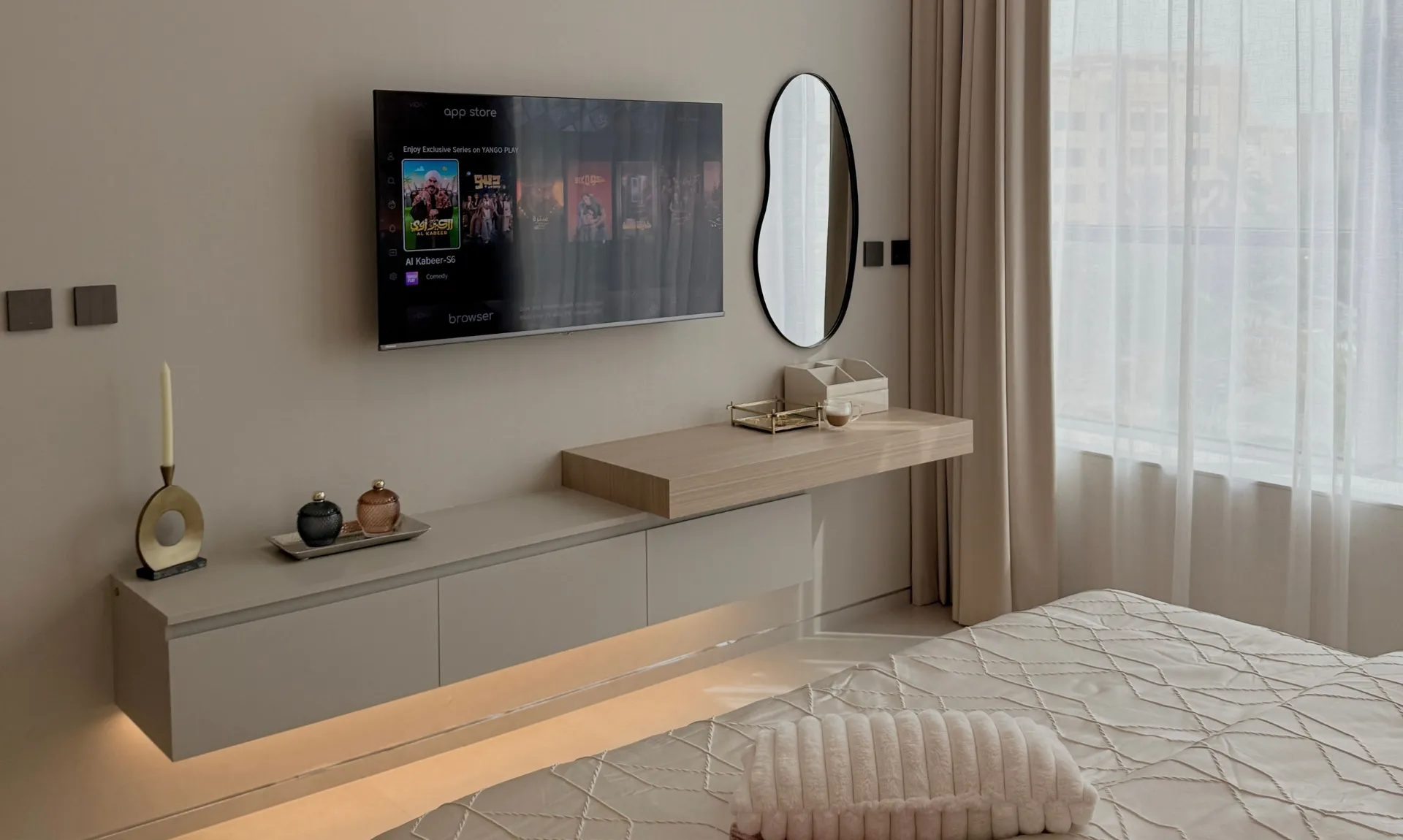 bedroom decor with a mirror and warm light