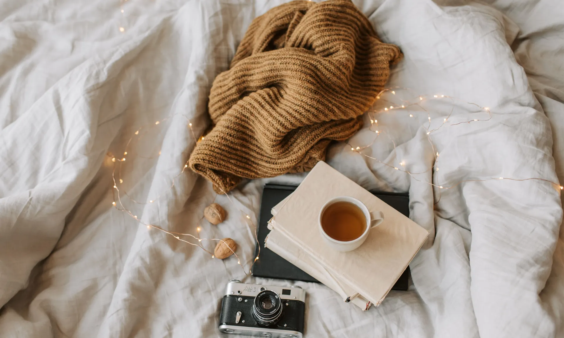books and chunky sweater fall inspo